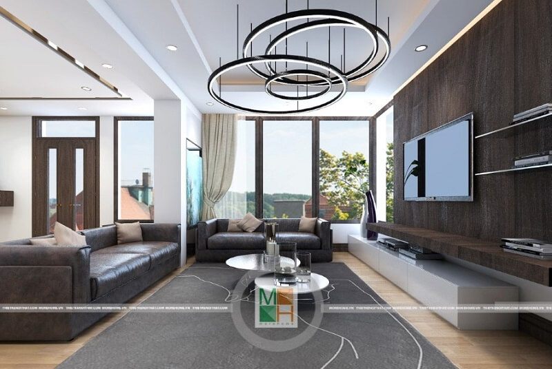 Mẫu thiết kế phòng khách chung cư sang trọng với bộ sofa bọc da cao cấp tạo điểm nhấn nổi bật cho căn phòng